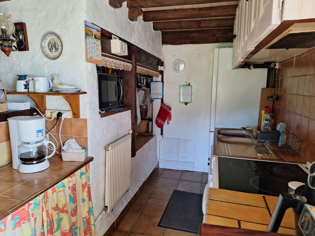 Grande maison de village en pierre avec jardin et dépendances - photo 10