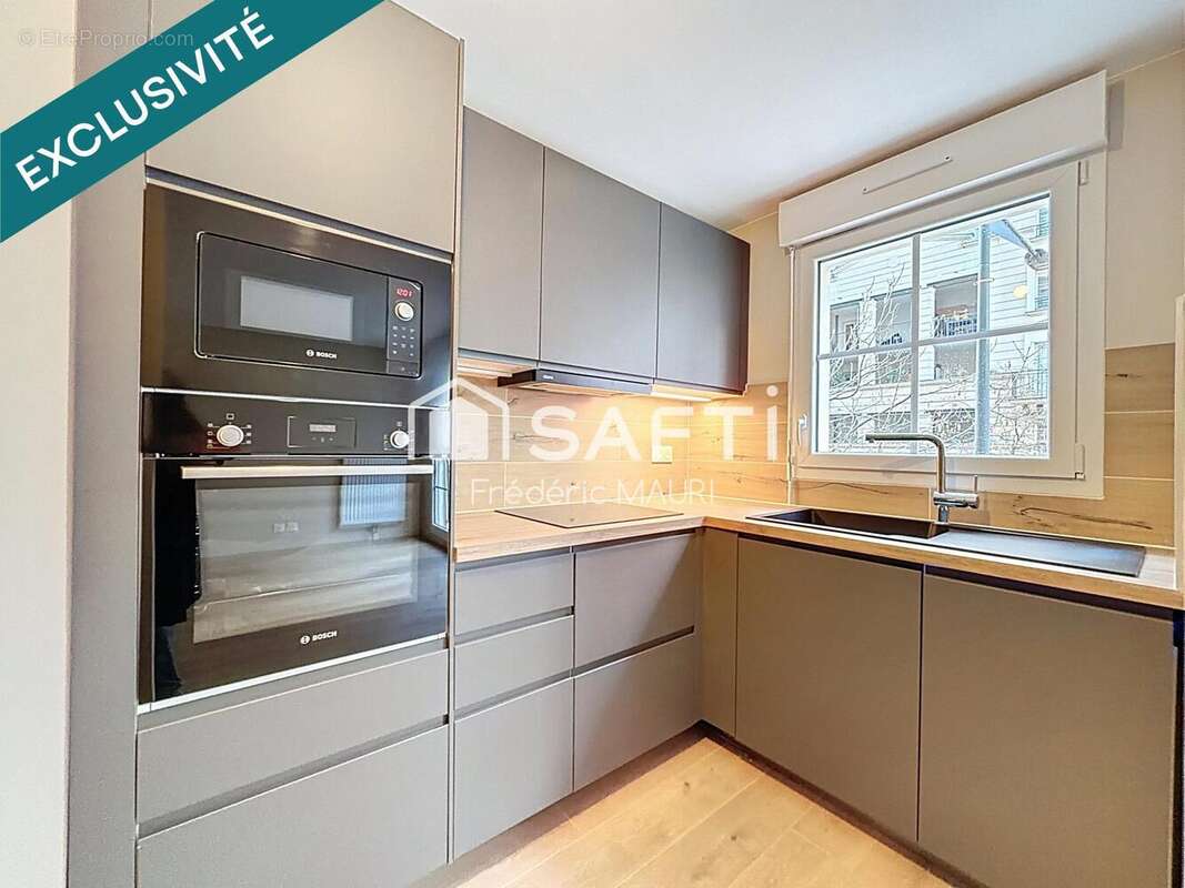 Photo 4 - Appartement à COURBEVOIE