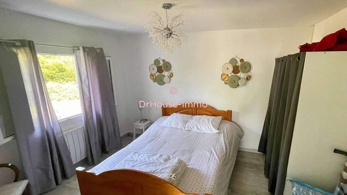Maison 91 m² à Montredon-Labessonnie  - photo 7