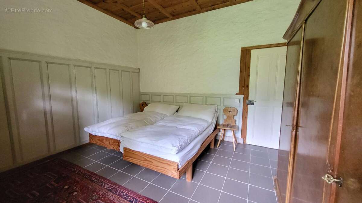 24410 Maison  atypique  sur 2 niveaux entre Riberac  et Saint Aulaye parcelle de  4ha et un étang - photo 8
