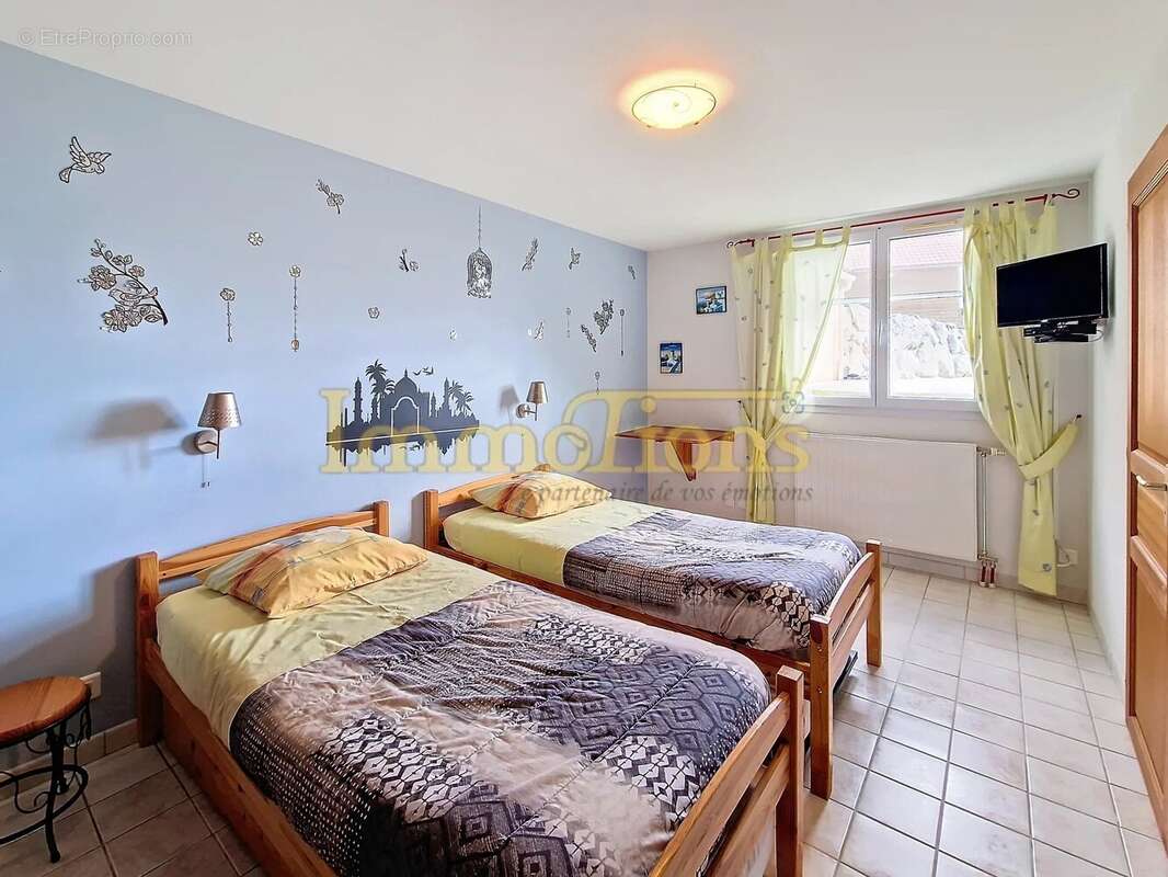 Maison à ROMANS-SUR-ISERE