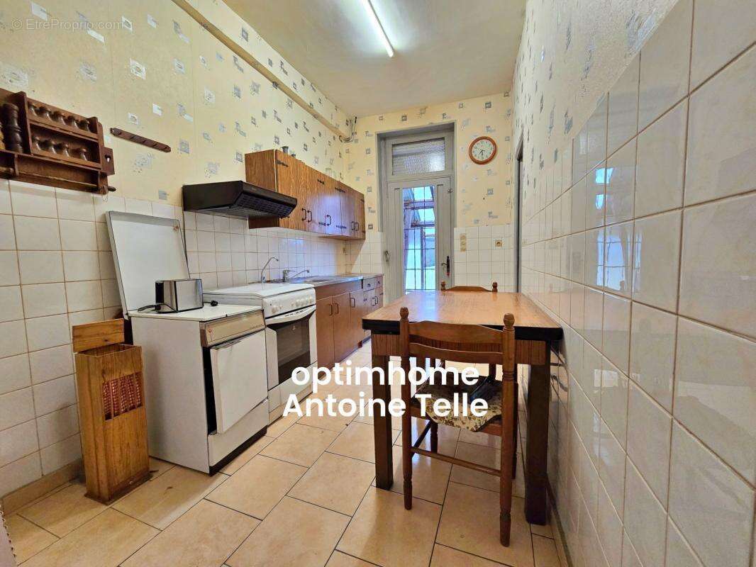 Le Cateau - Maison semi-individuelle à double accès avec garage, devanture & jardin clos sur 960m² - photo 3