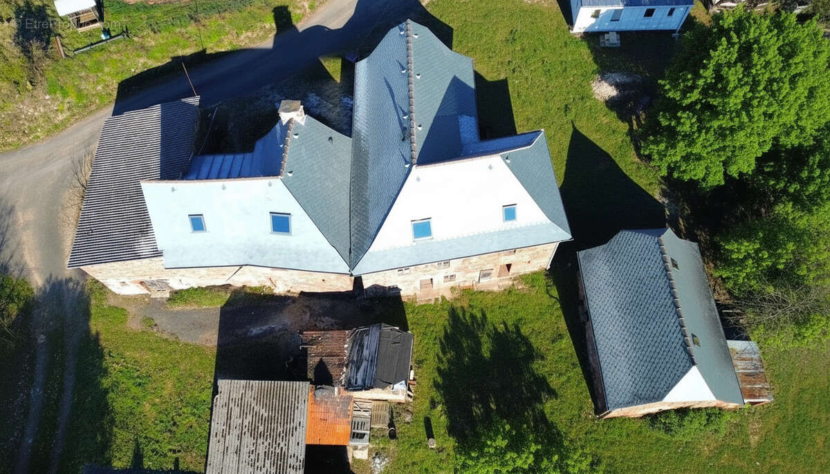 Ensemble en pierre, à rénover  avec terrain certifié AB  VILLECOMTAL - photo 4