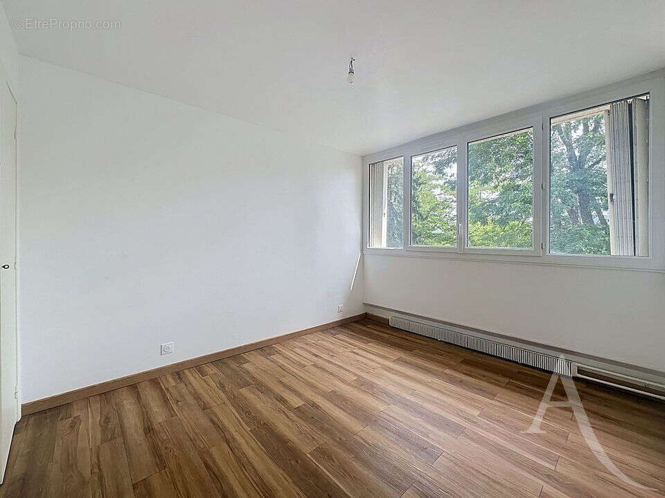 EXCLUSIVITÉ - Appartement F3 56 m² avec balcon, 2 chambres, cave et cuisine équipée - photo 3