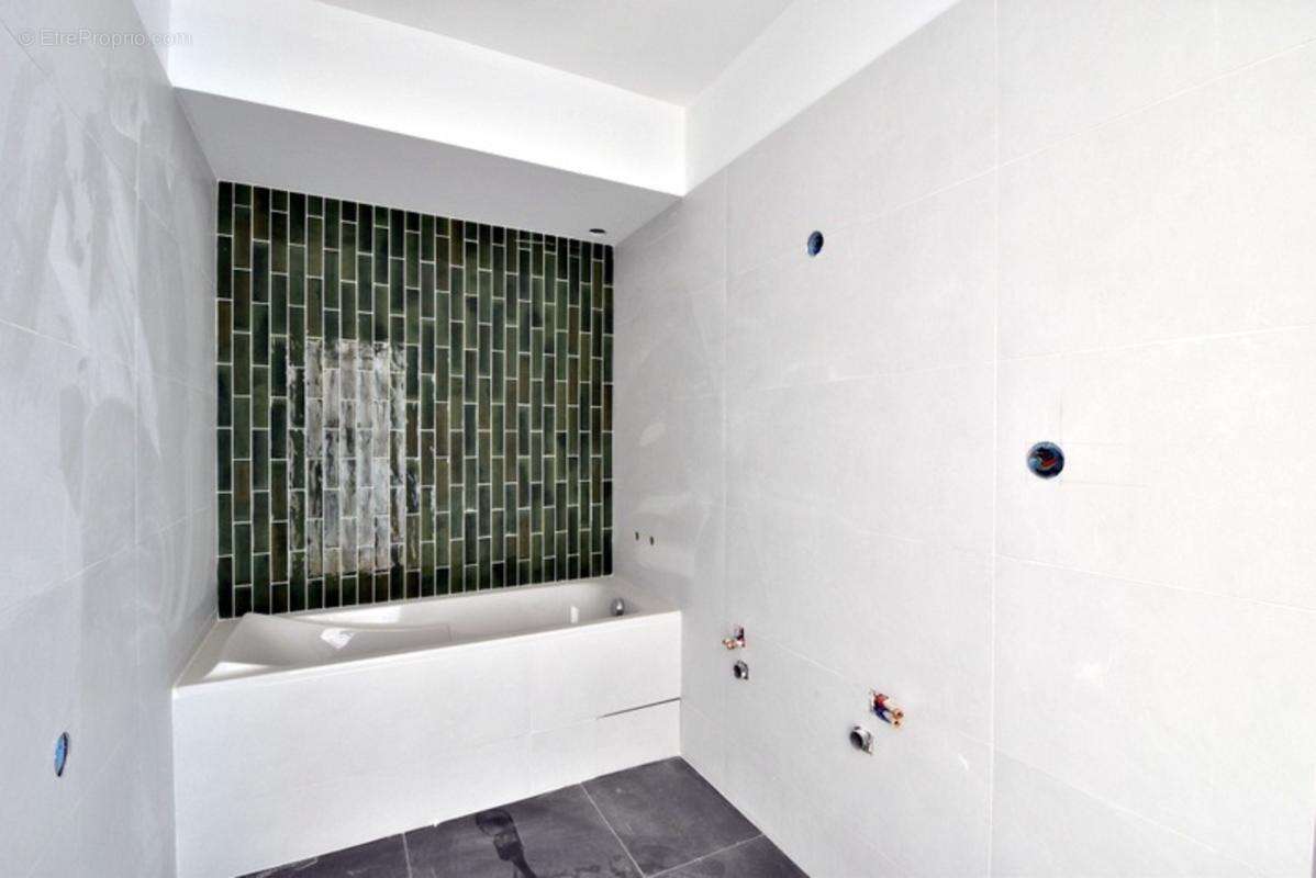 EXCLUSIVITE - Appartement T4 rez de jardin - Garage et parkings - photo 13