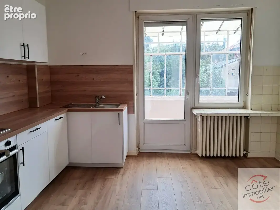 Appartement bourgeois -  1er etage - beaux volumes - photo 6
