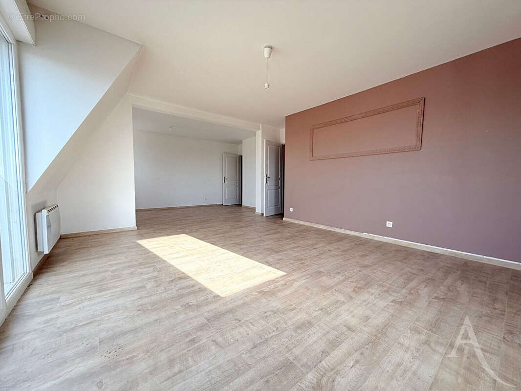 Appartement spacieux en dernier étage - photo 3