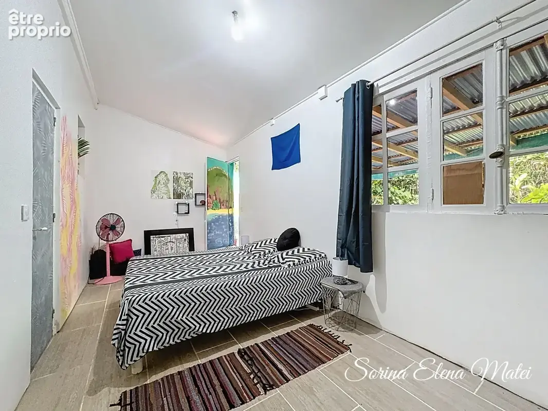 Maison avec piscine au cœur d’un écrin tropical - 5 pièces PETIT BOURG (971) - photo 13