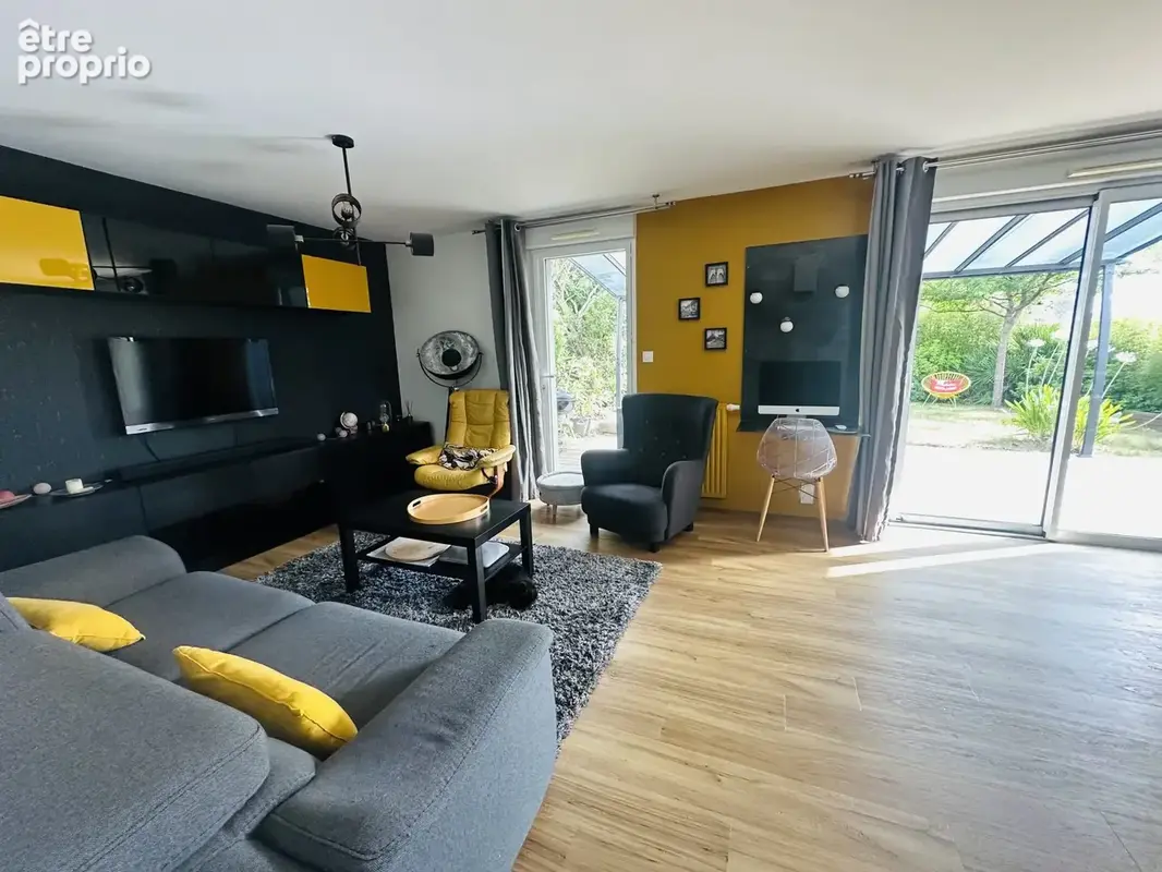 Maison 129 m² à La Chapelle-Des-Fougeretz  - photo 7