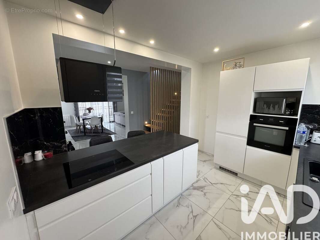 Photo 2 - Maison à FLEURY-LES-AUBRAIS