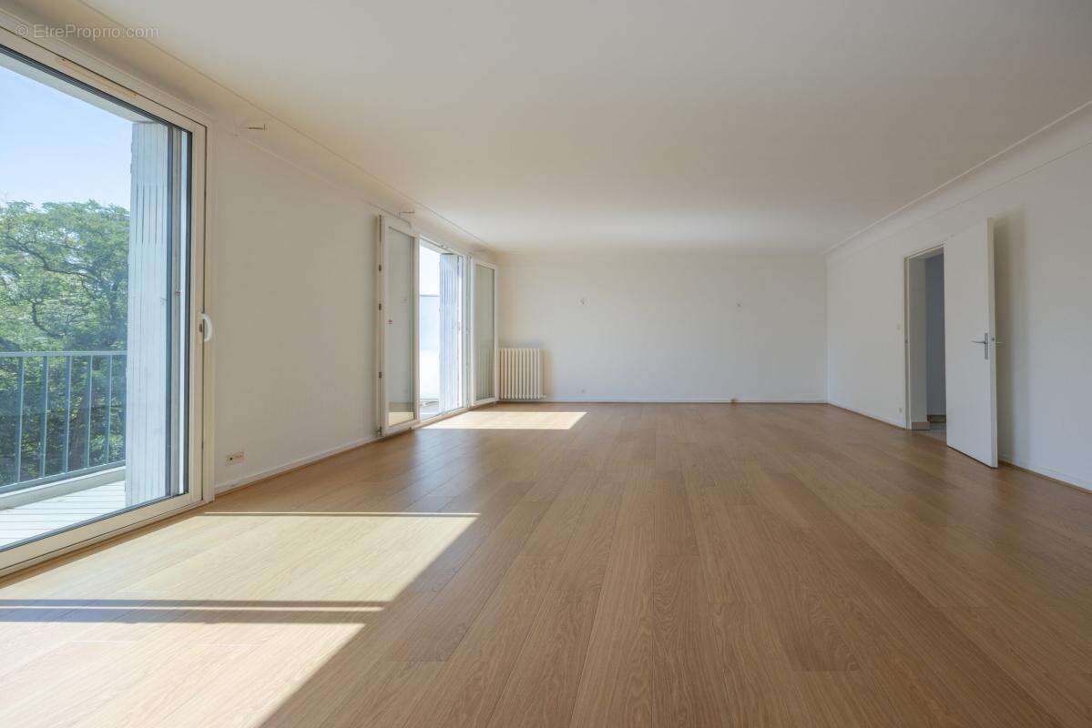 T4 en dernier étage de 97 m² - photo 2
