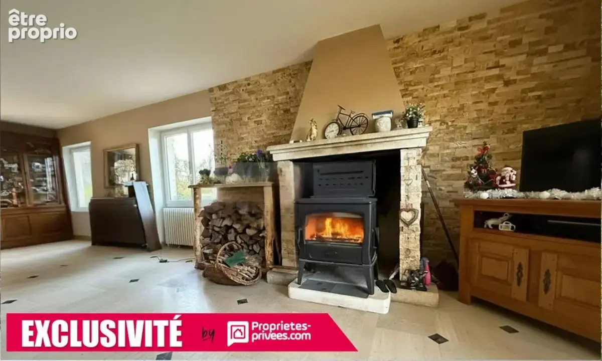 Maison familiale en pierres - Brive Ouest - Espace à vivre de PLAIN PIED - Terrain 5 038 m² - photo 4