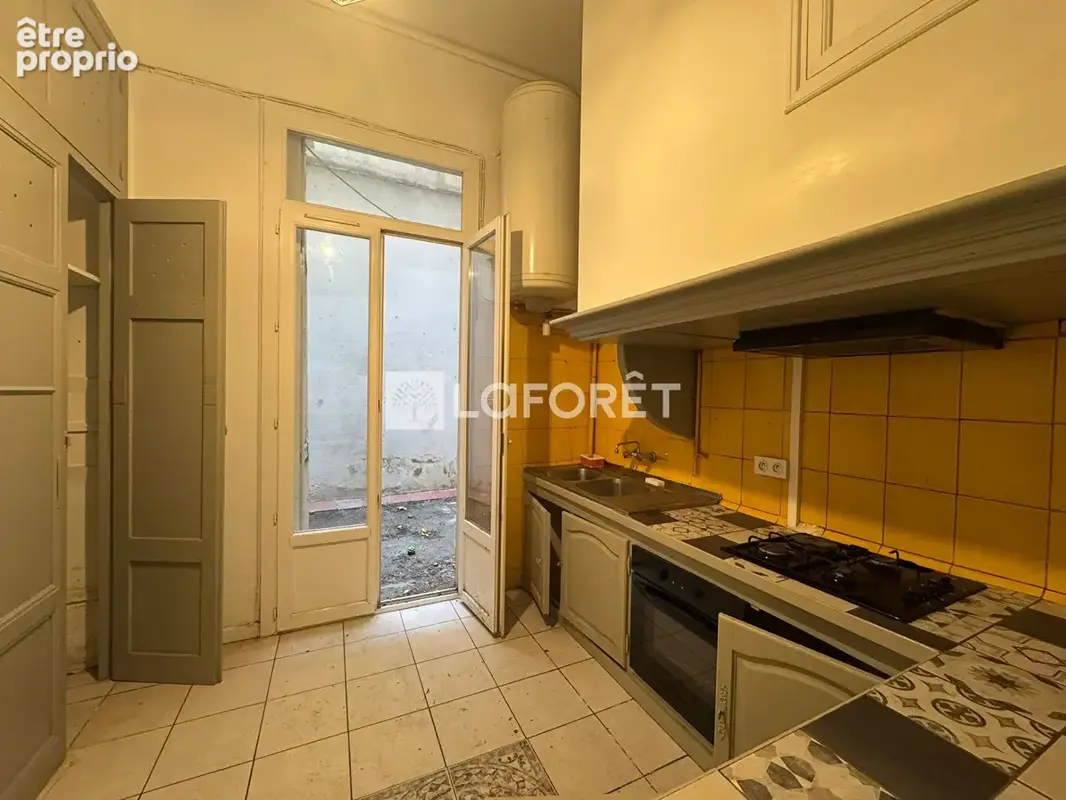 Appartement T2 rez-de-jardin centre ville - photo 4