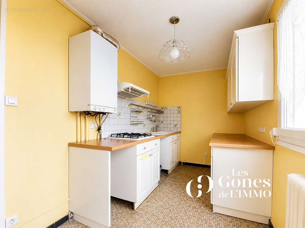 Ecully   Appartement T4 de 74 m2 avec balcon et cave - photo 2