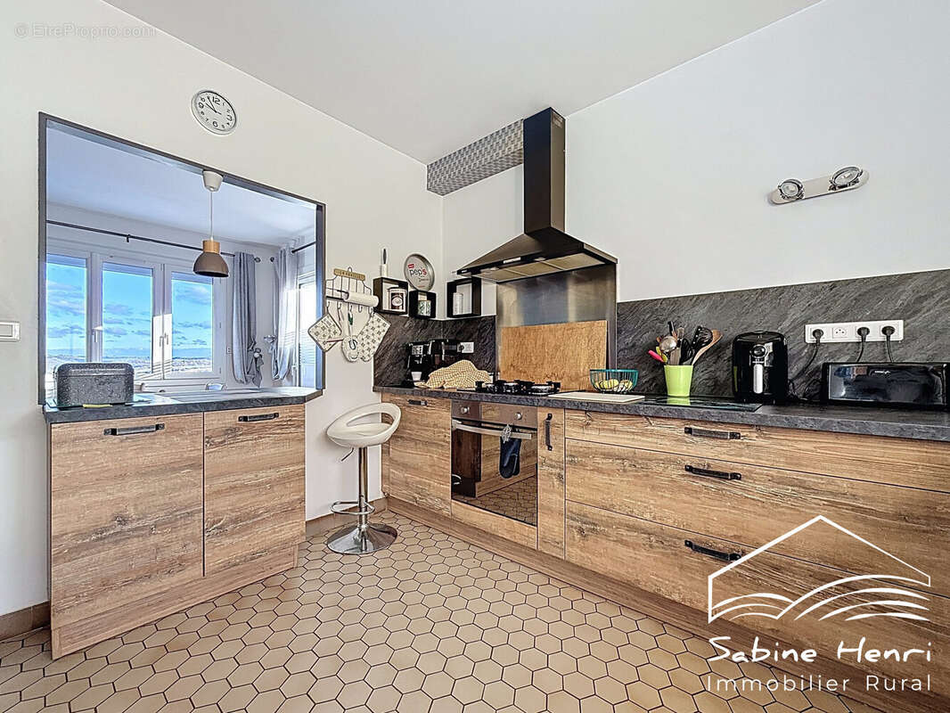 Maison à MIRANDOL-BOURGNOUNAC