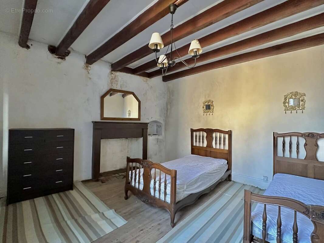 Charmante maison située en plein cœur du centre du village - photo 11