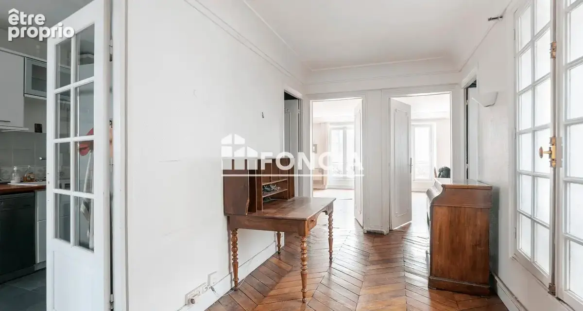 Appartement familial spacieux-immeuble haussmannien d'angle avec gardien-gare du nord - photo 4