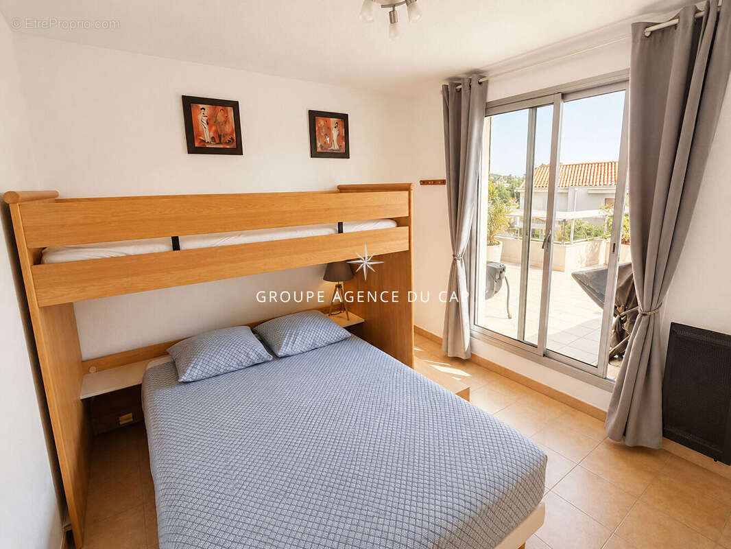 A vendre appartement dans residence securisee avec piscine 3 pieces 2 chambres terrasse sur le toit et veranda cave parking et p - photo 5