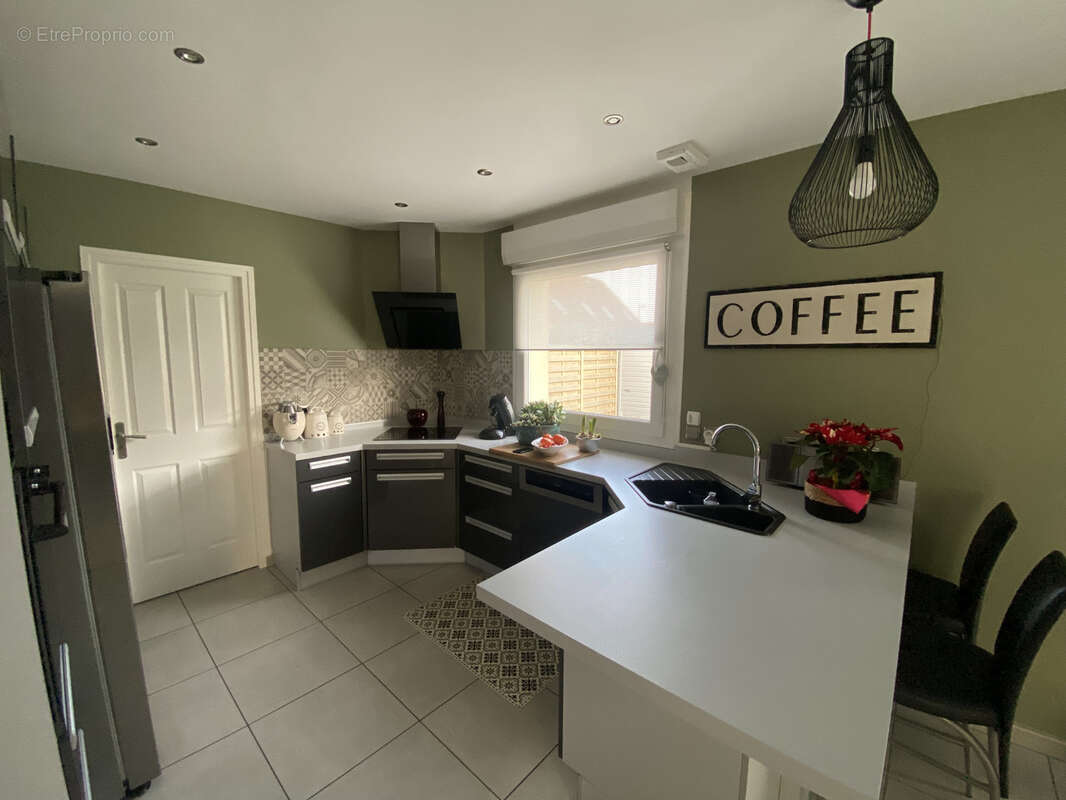 Maison à COURRIERES