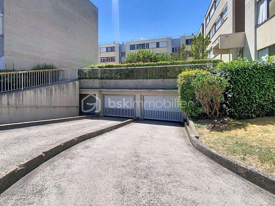 Parking double en enfilade  (box + emplacement) en sous-sol sécurisé-26m² - photo 2
