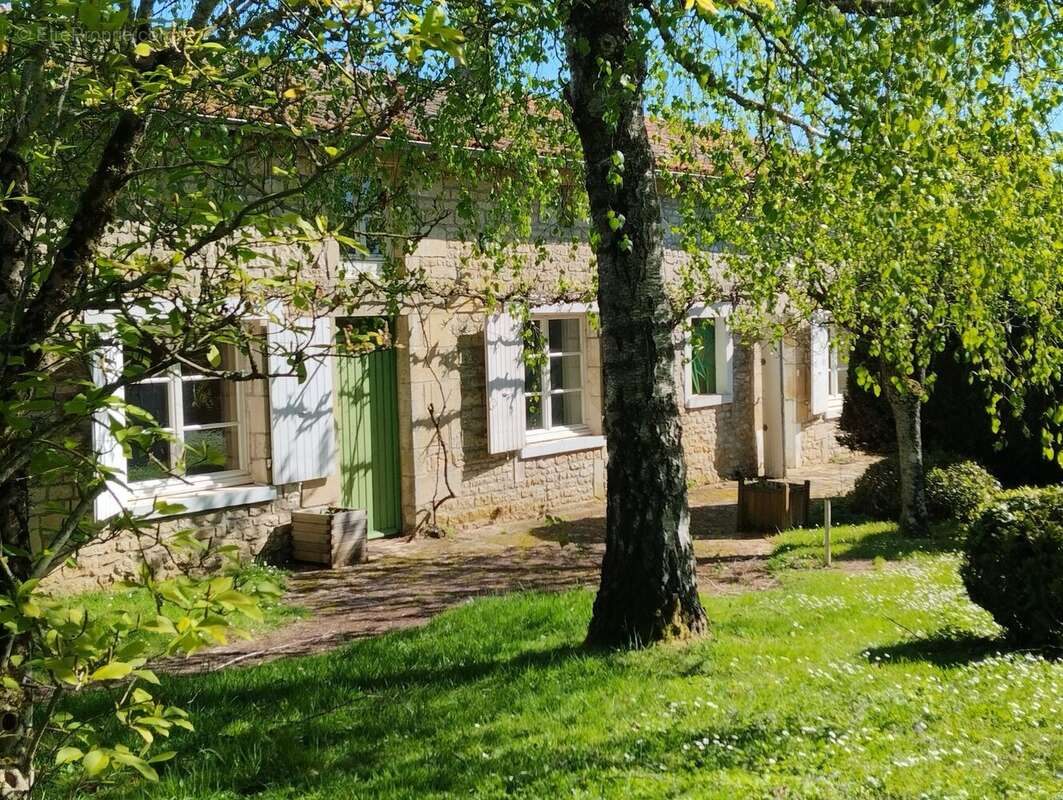 Maison à AUBIGNE