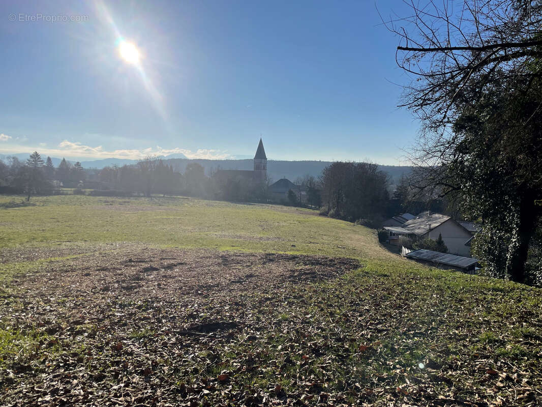 Terrain à CHAMPAGNE-EN-VALROMEY