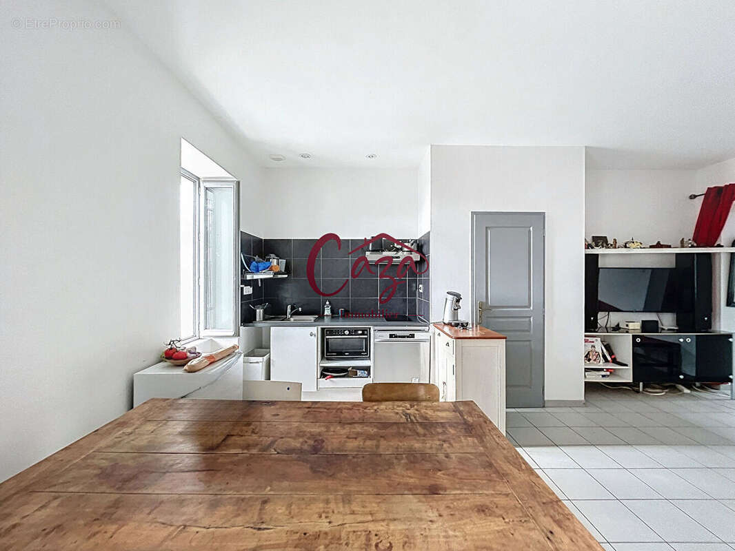 Maison de 55 m2 Cambalnes et Meynac centre bourg - photo 3