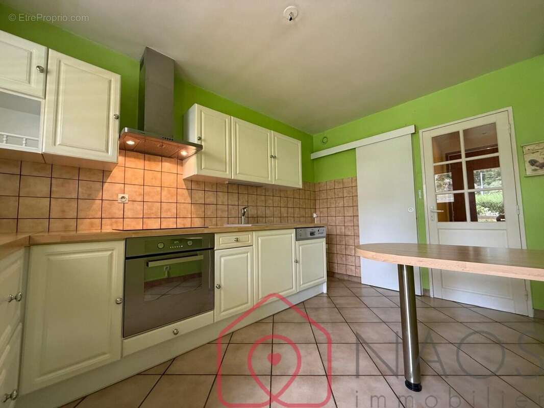 Appartement t2 en rez-de-chaussée avec balcon filant, cave et stationnements - photo 6