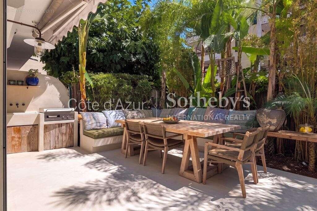 Appartement de prestige à Cannes Palm Beach avec terrasse paysagée, piscine privée et garage - photo 3