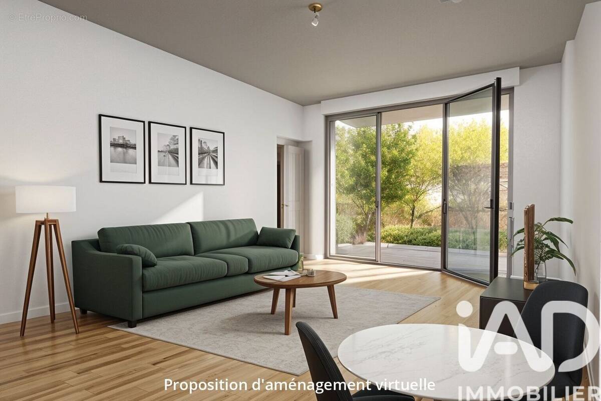 Photo 1 - Appartement à BOUGUENAIS