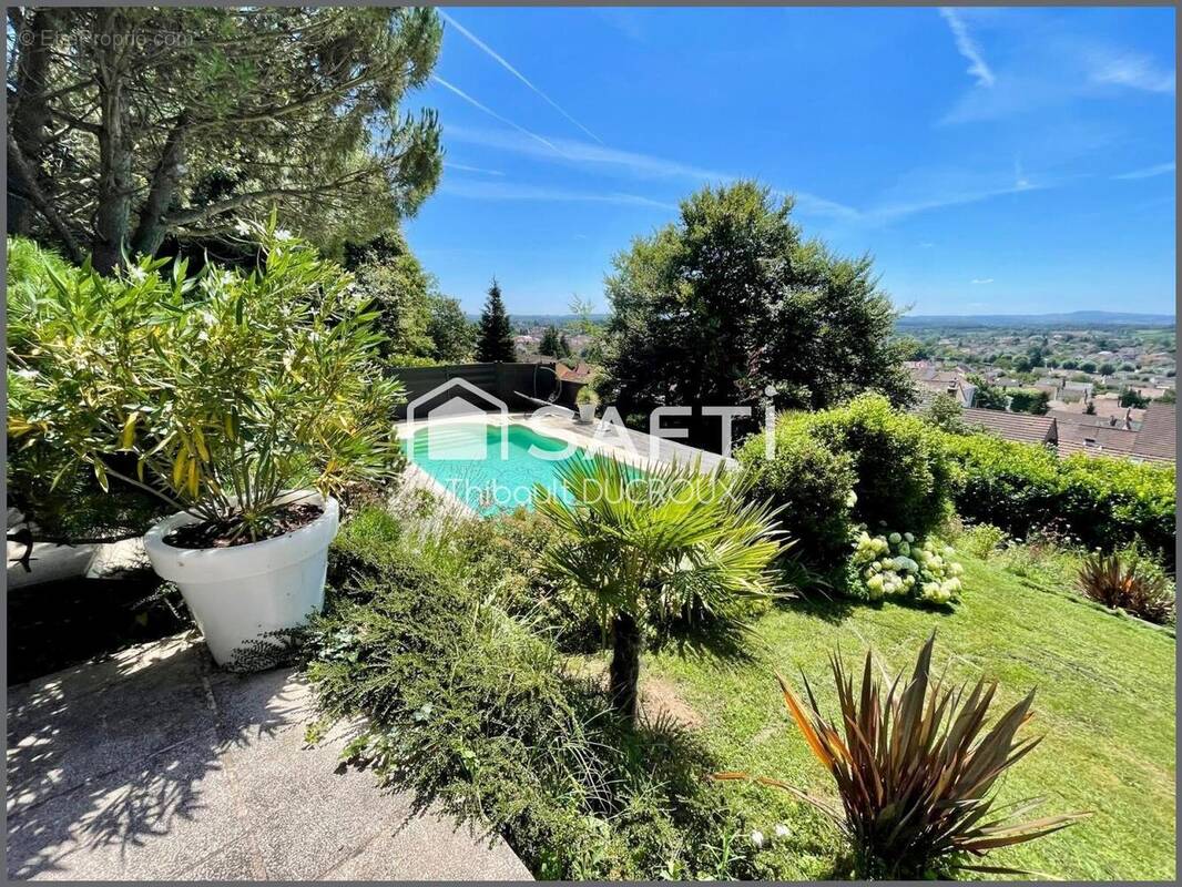 Photo 1 - Maison à LE CREUSOT