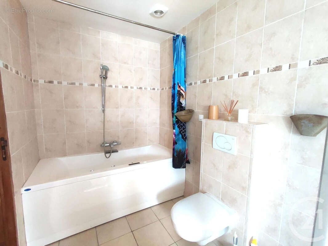 Maison 115 m² à Saint-Amand-En-Puisaye  - photo 10