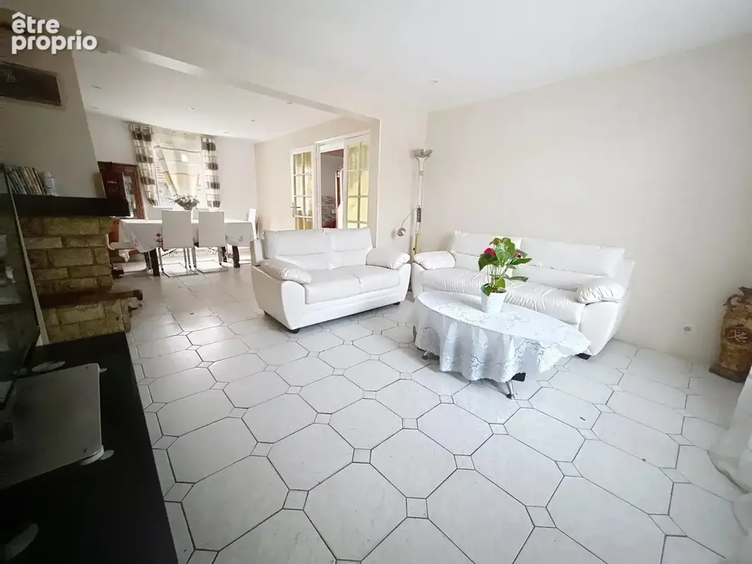 EXCLUSIVITÉ – Maison familiale 5 chambres avec jardin, véranda et garage - photo 4