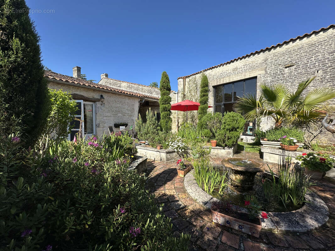 Maison à COURBILLAC