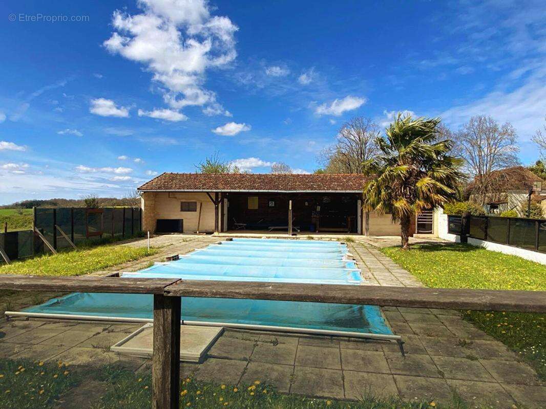 Maison en pierre avec piscine à Excideuil 5 pièce(s) 180 m2 - photo 16