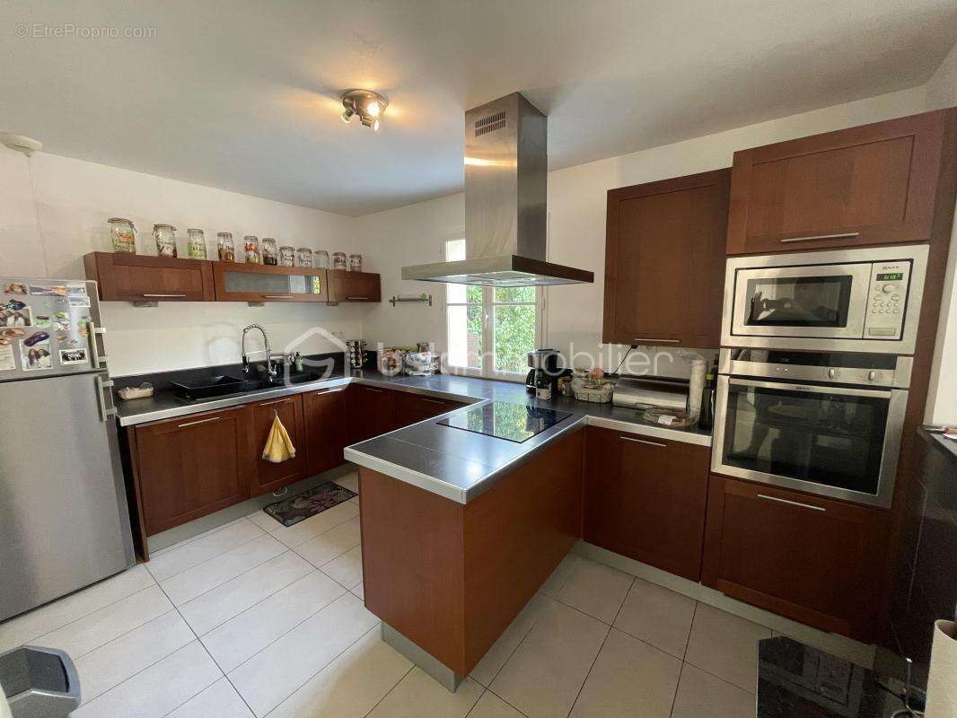 Maison BOIS LE ROI - 131m² - 4 chambres - photo 6
