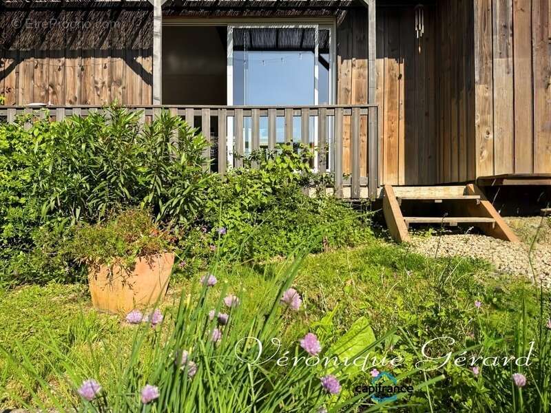 Maison de Plain-pied de 170 M2 en ossature bois, très lumineuse édifiée sur sous-sol - photo 4