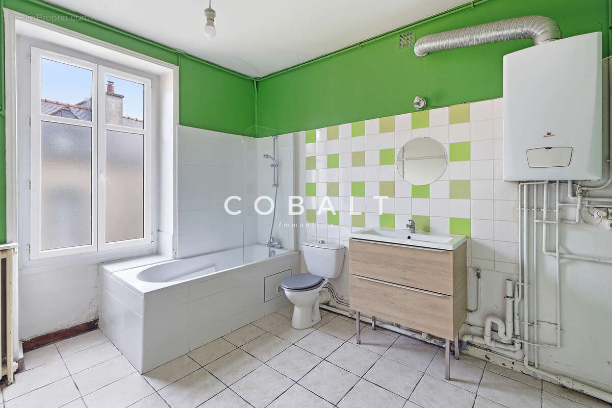 À deux pas du marché Talensac, un appartement de caractère à réinventer - photo 5