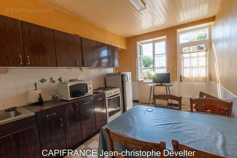 Maison à vendre GORRON (53) maison en pierres 3 chambres avec dépendances sur terrain de 3450 m2 - photo 6