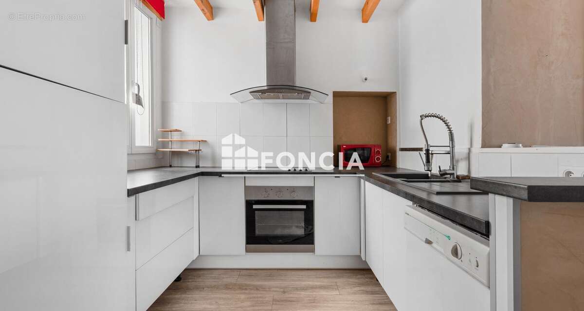 Duplex T3 au coeur de la ville - photo 2