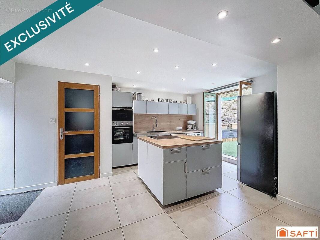 Photo 1 - Maison à SATHONAY-VILLAGE