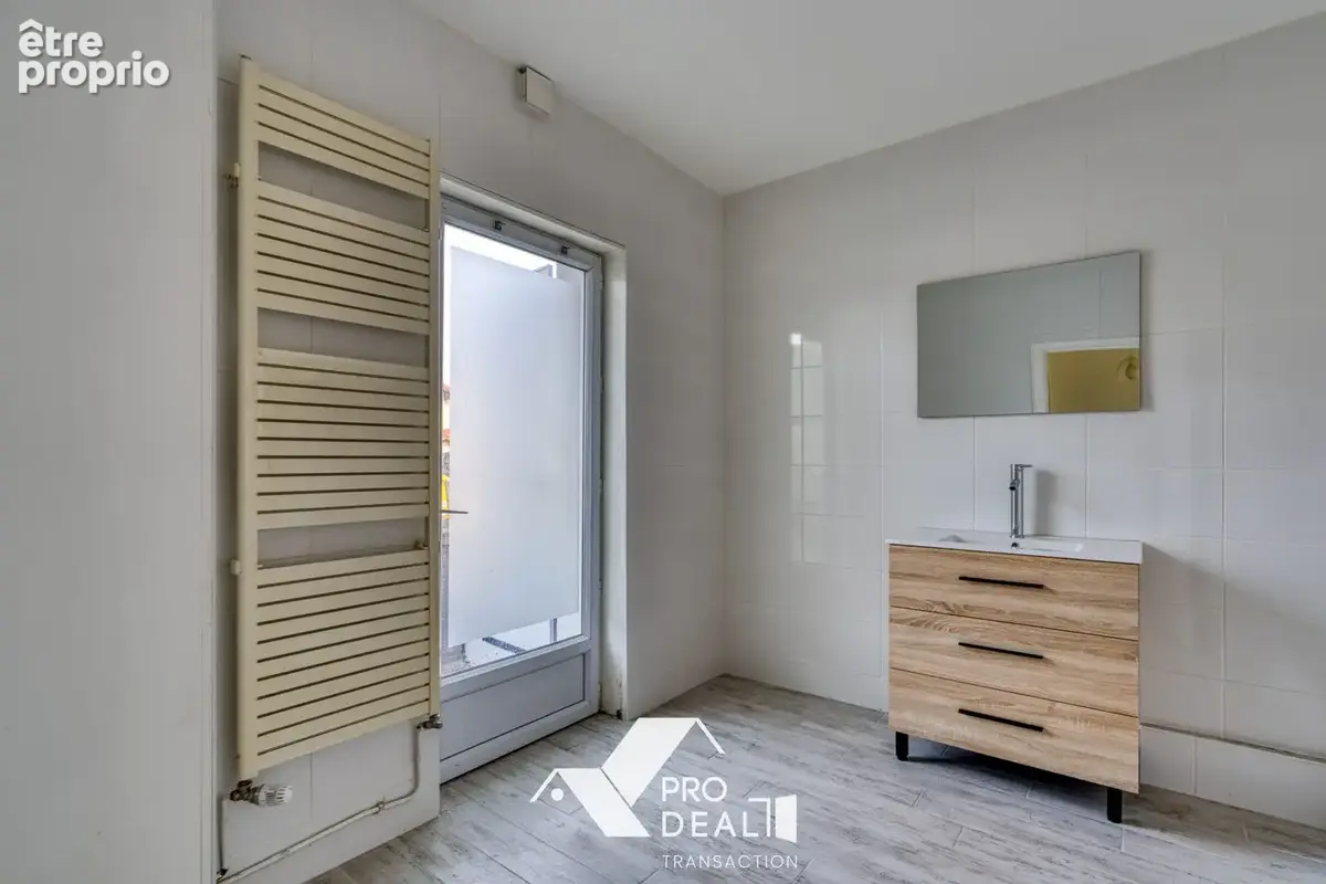 Maison 4 pièces 103 m² à vendre à Bron (69500) - photo 8