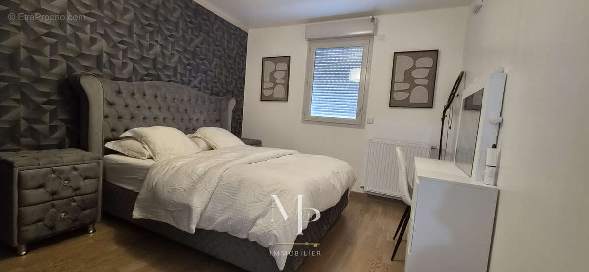 Jolie T3 de 66 m2 dans une résidence sécurisée avec garage - photo 3
