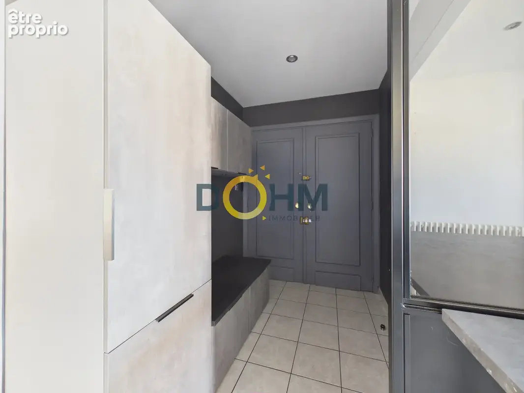 Appartement T4 de 109 m2 rénové avec goût au 1er étage avec ascenseur - photo 11