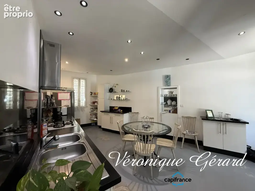 Belle maison en pierre de taille de 252 m², 7 chambres, combles aménageables, jardin paysager,3 garages - photo 8