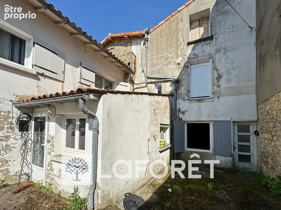Immeuble de rapport - 3 lots loués et 2 appartements à rénover - photo 4