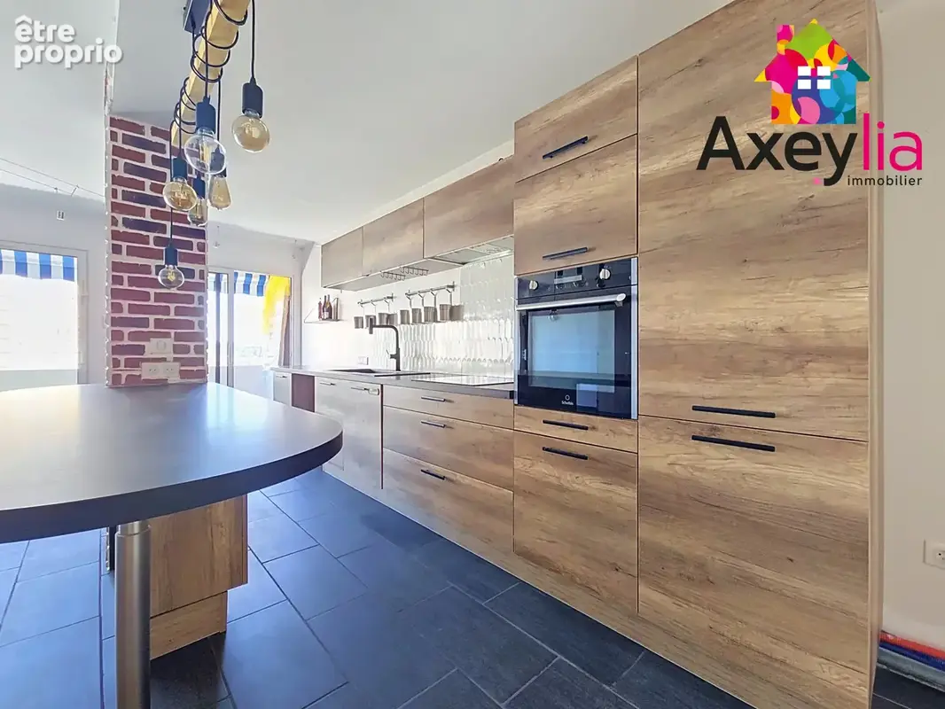 A vendre - roanne - appartement 3 chambres avec cave et place de parking privative - photo 2