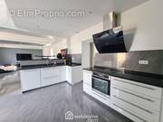 Une cuisine américaine toute équipée haut de gamme. - Maison à AUGERVILLE-LA-RIVIERE