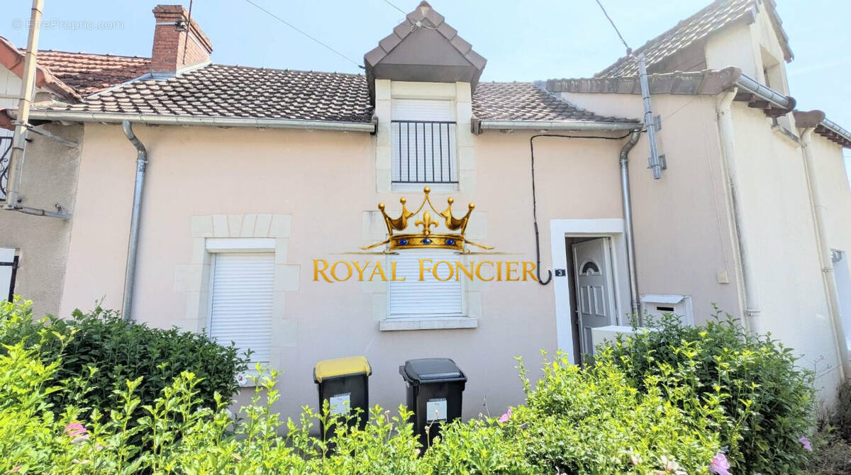 Maison Mitoyenne 