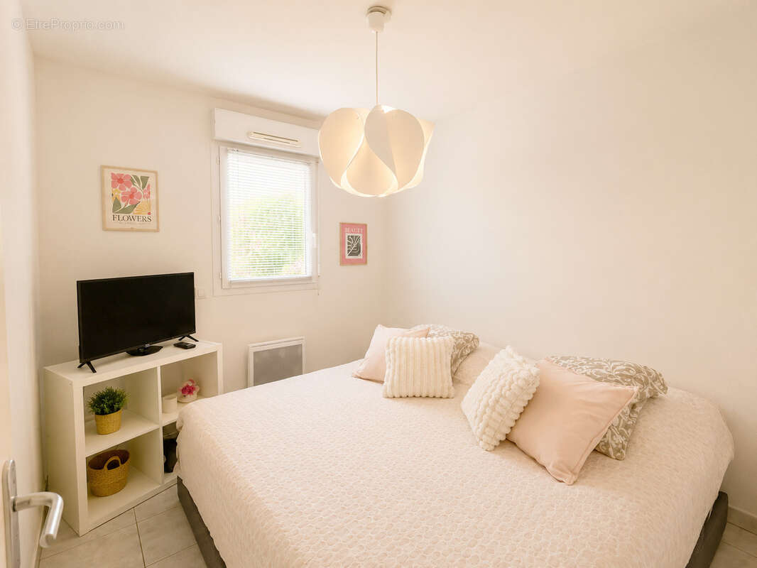 Appartement T3 en rez de jardin de 62 m2 + garage dans résidence de standing - photo 10